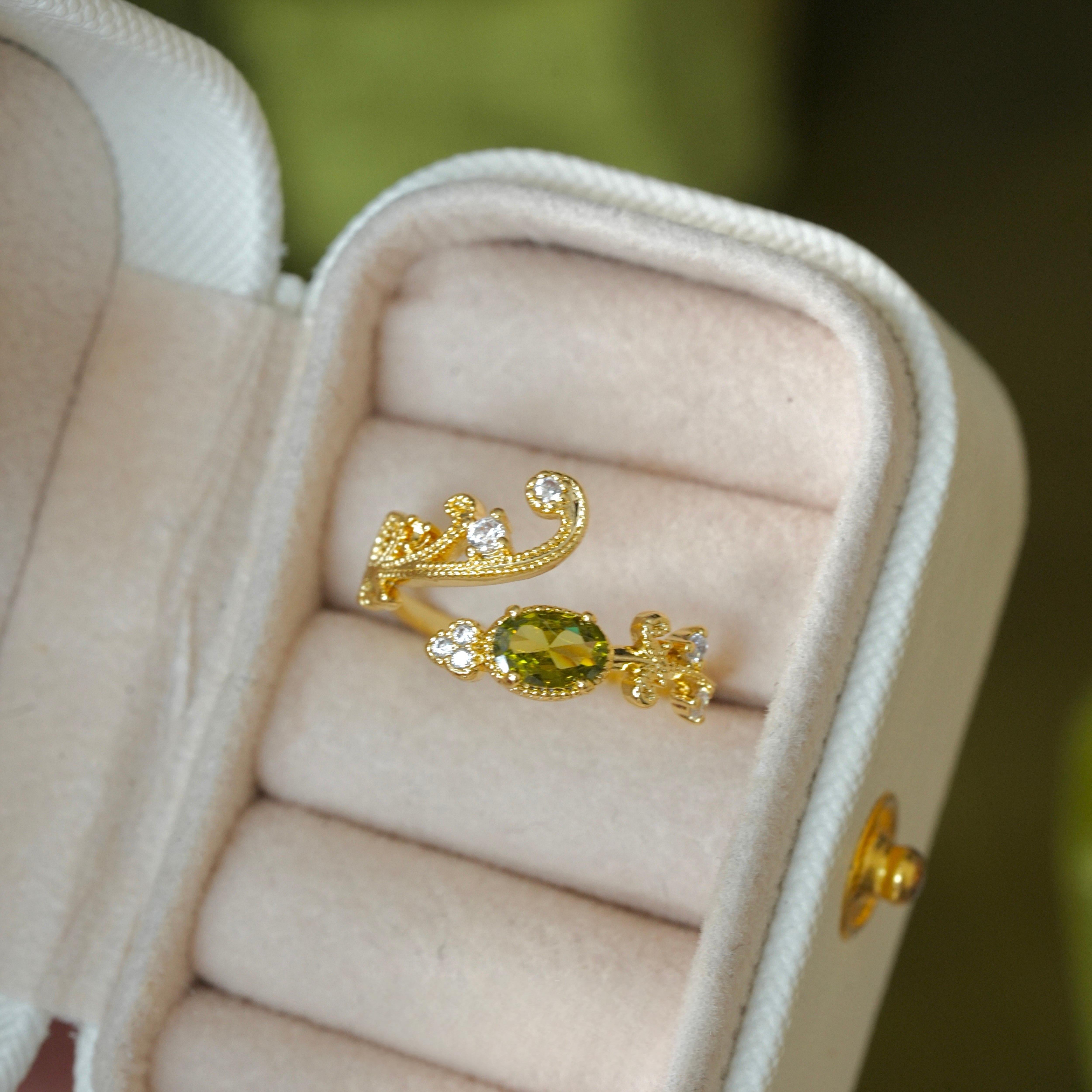 olive-green gemstone ring olive-green gemstone ring