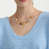 Vintage Freshwater Pearl Cross Necklace – 18K Gold-Plated Stainless Steel