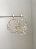 Gold coil pearl earring
