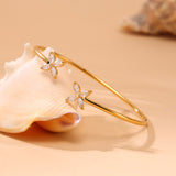 18K Gold Plated Stainless Steel Ocean Bracelet – CZ Fish & Starfish Open Bangle