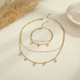 Double-Layer Starburst Necklace & Bracelet – Stainless Steel with Cubic Zirconia