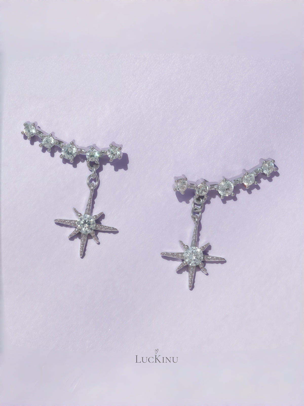 Stellar Curve Zircon Stud Earrings