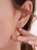 Stellar Curve Zircon Stud Earrings
