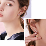 Stellar Curve Zircon Stud Earrings